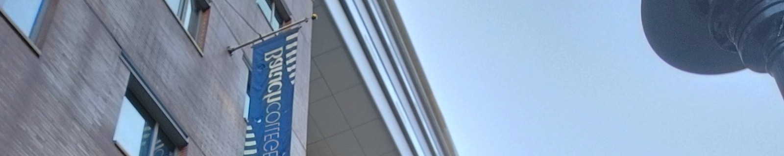 Baruch College banner visible in campus self-portrait
